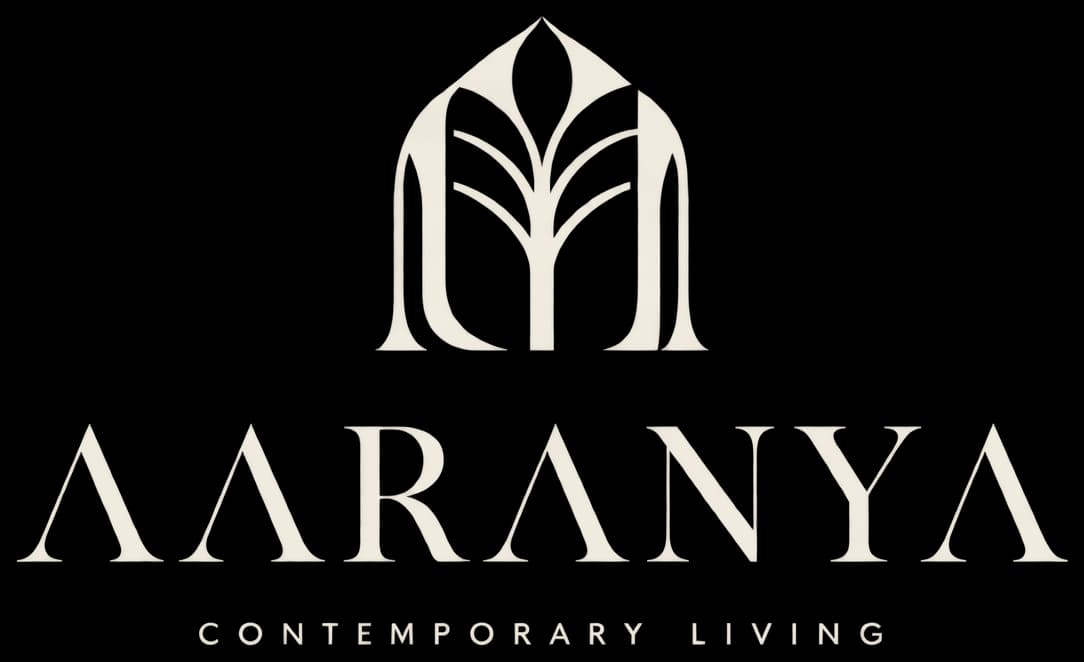 Aaranya cream logo on deep green background